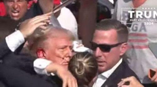 Donald Trump retirado de palco a sangrar após som de tiros interromper comício